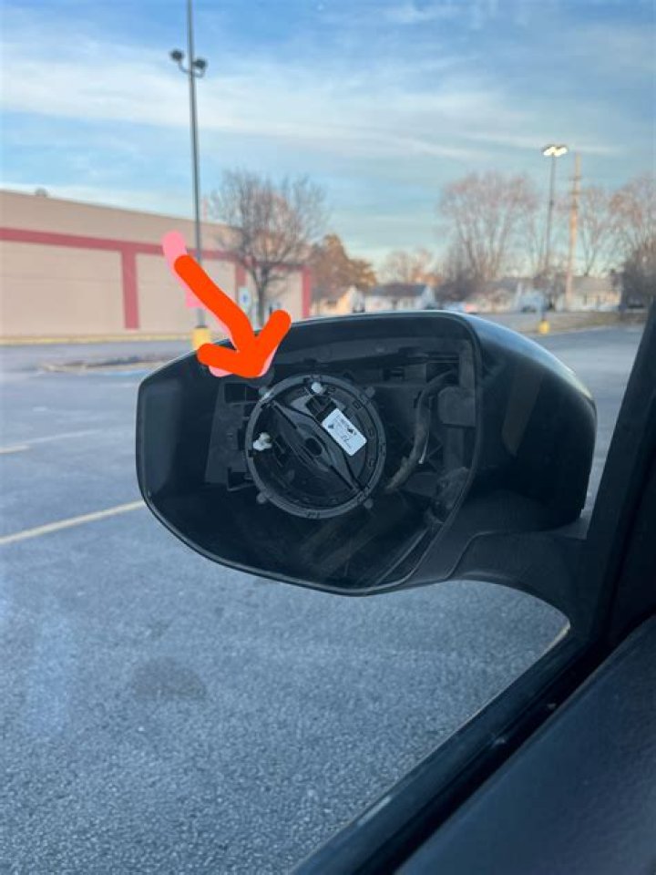 Can a side view mirror be reattached?
