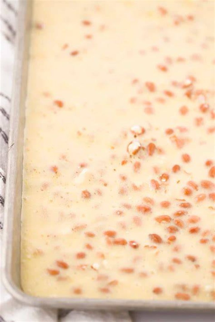 What does baking soda do in peanut brittle?